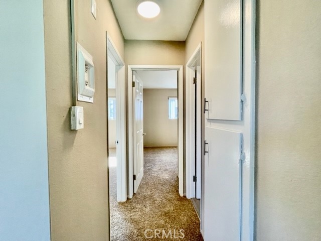 815 North Rose Avenue, Unit J Compton, CA 90221 - Photo 8 of 22 a view of a bathroom from a hallway