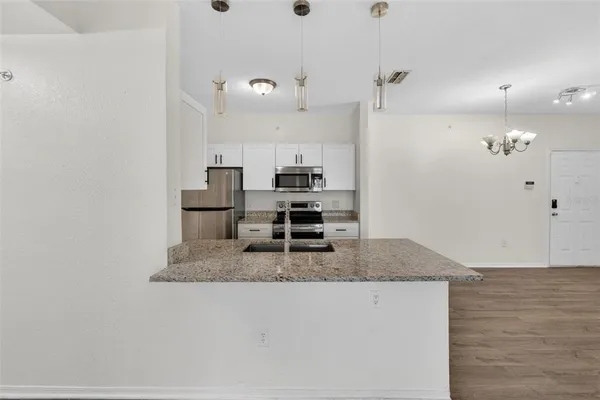 $275,000 | 5467 Vineland Road, Unit 6308, Orlando, FL 32811