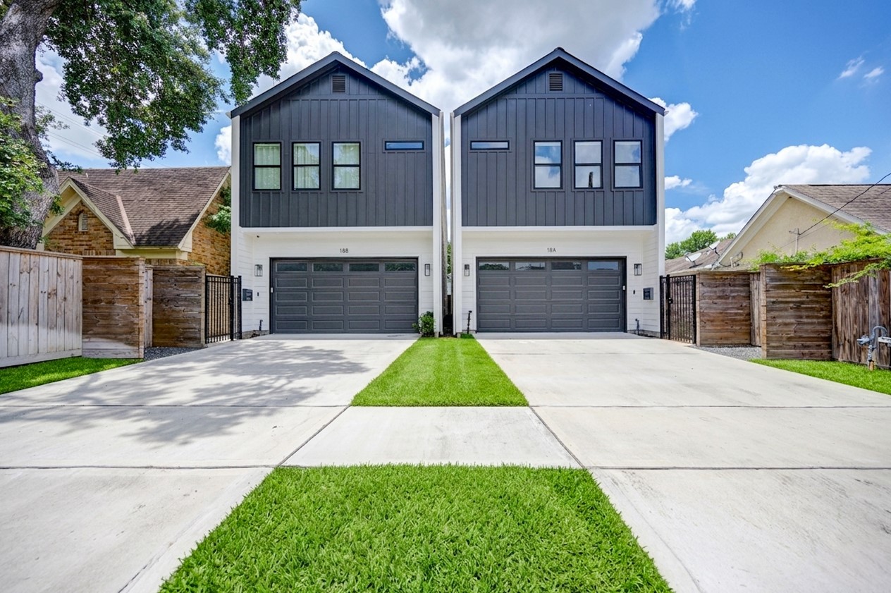 18 Sidney Street, Unit A Houston, TX 77003 - Photo 1 of 30 a front view of a house with yard and garage