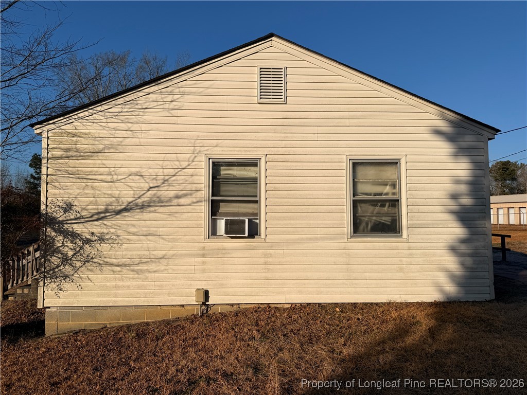 631 Bethel Baptist Road Spring Lake, NC 28390 - Photo 17 of 20 a view of a house with yard