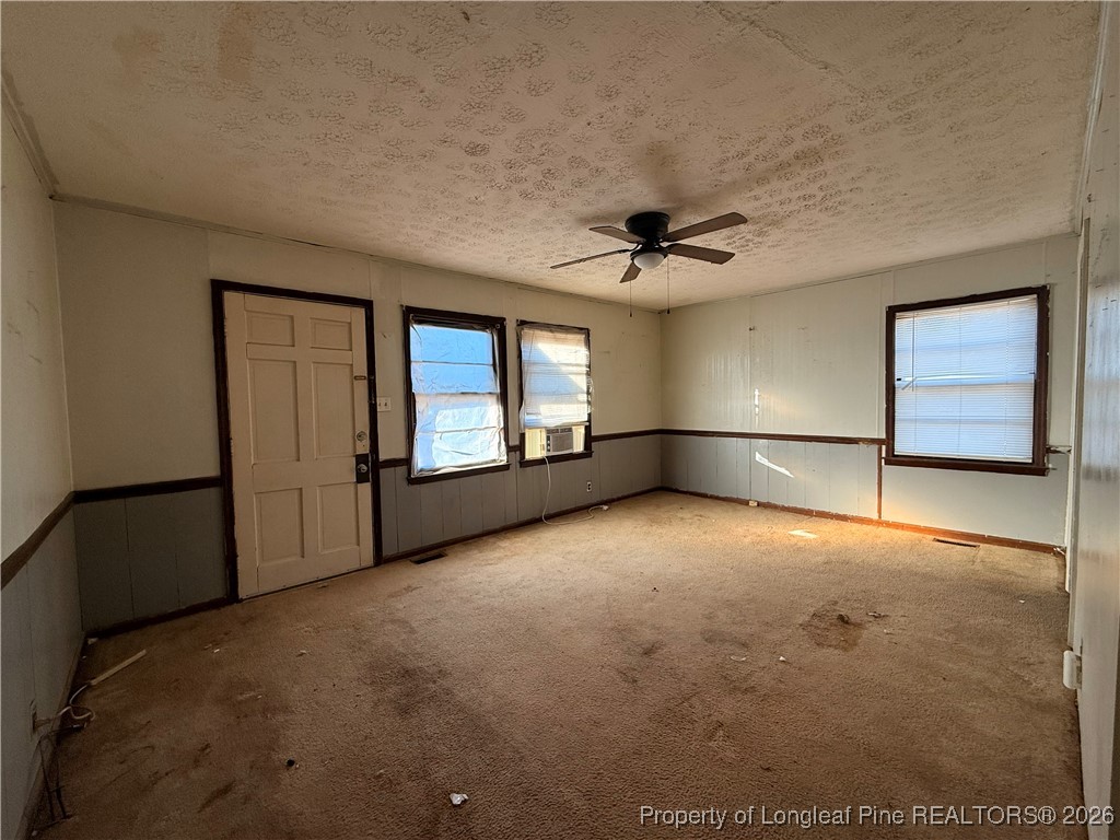 631 Bethel Baptist Road Spring Lake, NC 28390 - Photo 7 of 20 a view of an empty room with a window