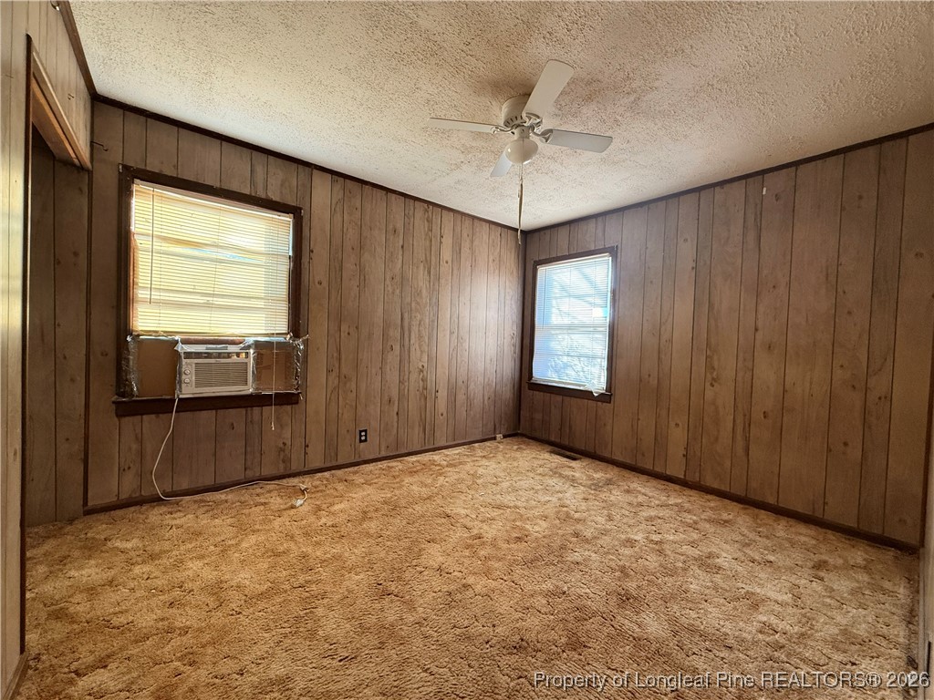 631 Bethel Baptist Road Spring Lake, NC 28390 - Photo 10 of 20 an empty room with windows and closet