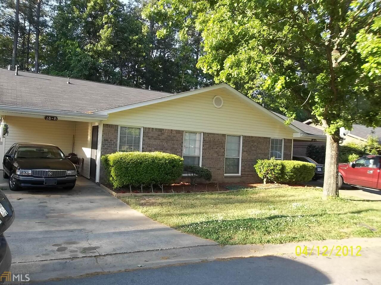 18 Conifer Ring, Unit A&B Rome, GA 30165 - Photo 1 of 1 a front view of a house with a yard