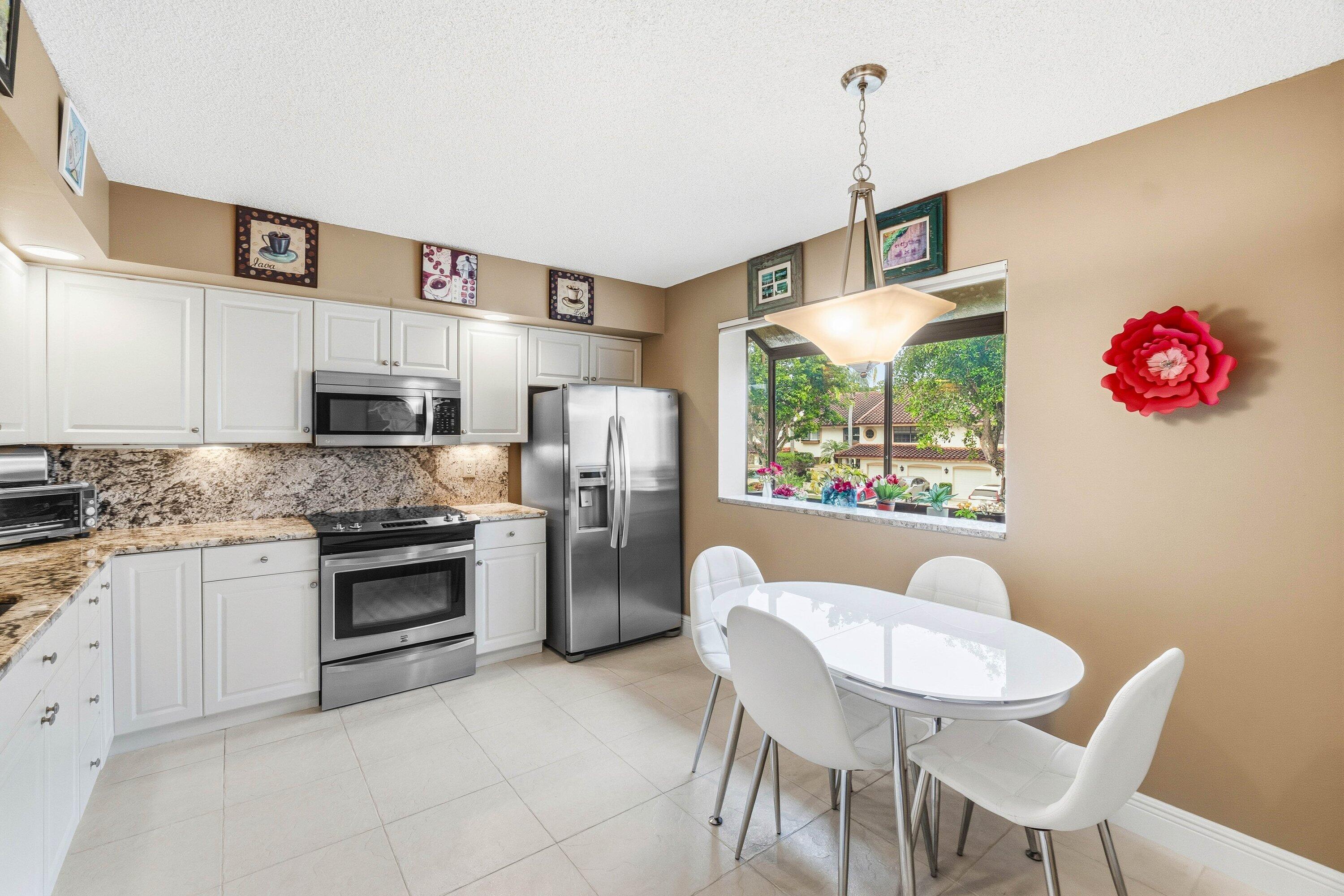 7759 La Mirada Drive Boca Raton, FL 33433 - Photo 7 of 37 EAT-IN KITCHEN