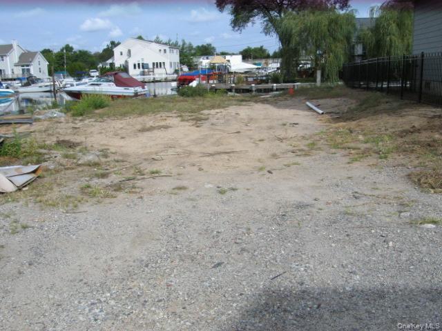 635 Arthur Street Baldwin, NY 11510 - Photo 7 of 7 a view of a backyard of a house