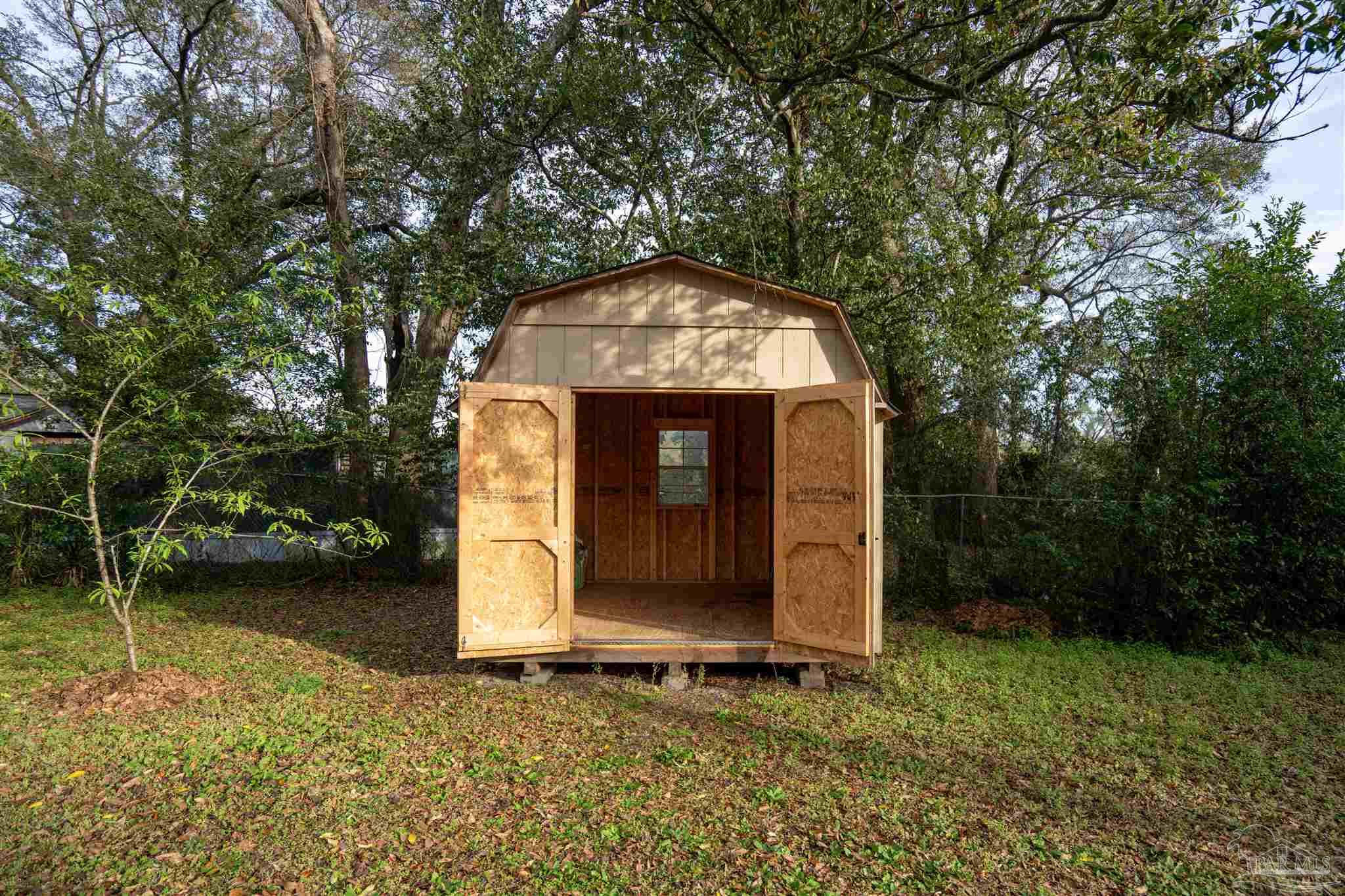 409 Frisco Road Pensacola, FL 32507 - Photo 24 of 27 a view of a small garden