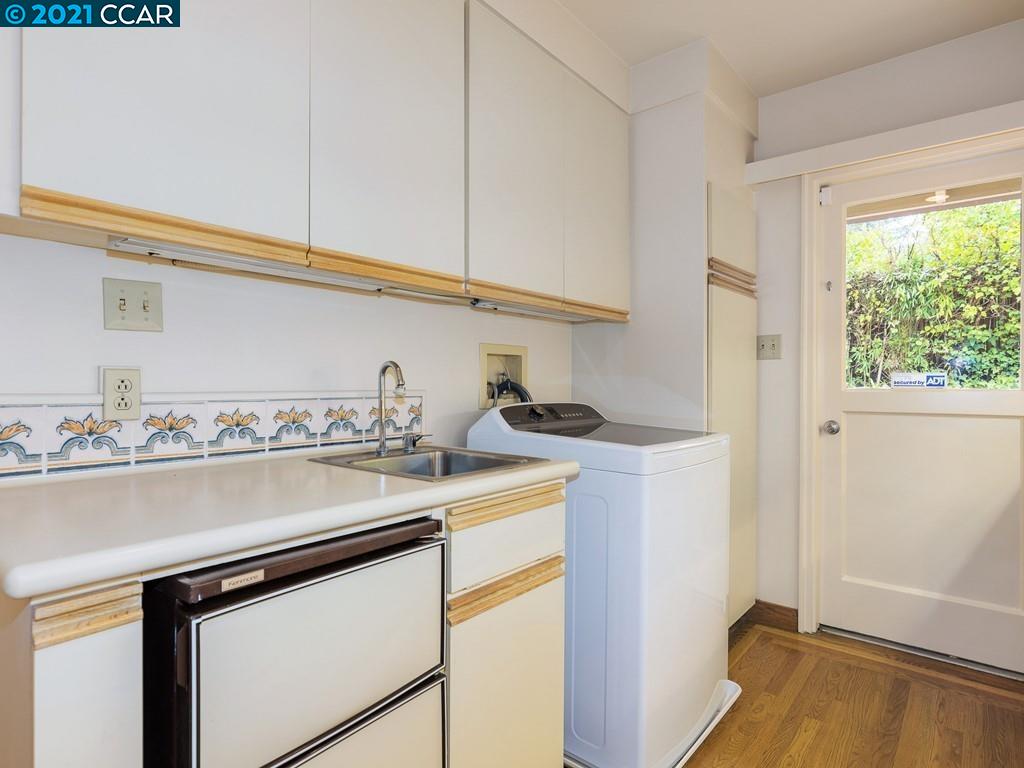 71 Orchard Road Orinda, CA 94563 - Photo 14 of 24 a view of a kitchen with sink and wooden floor