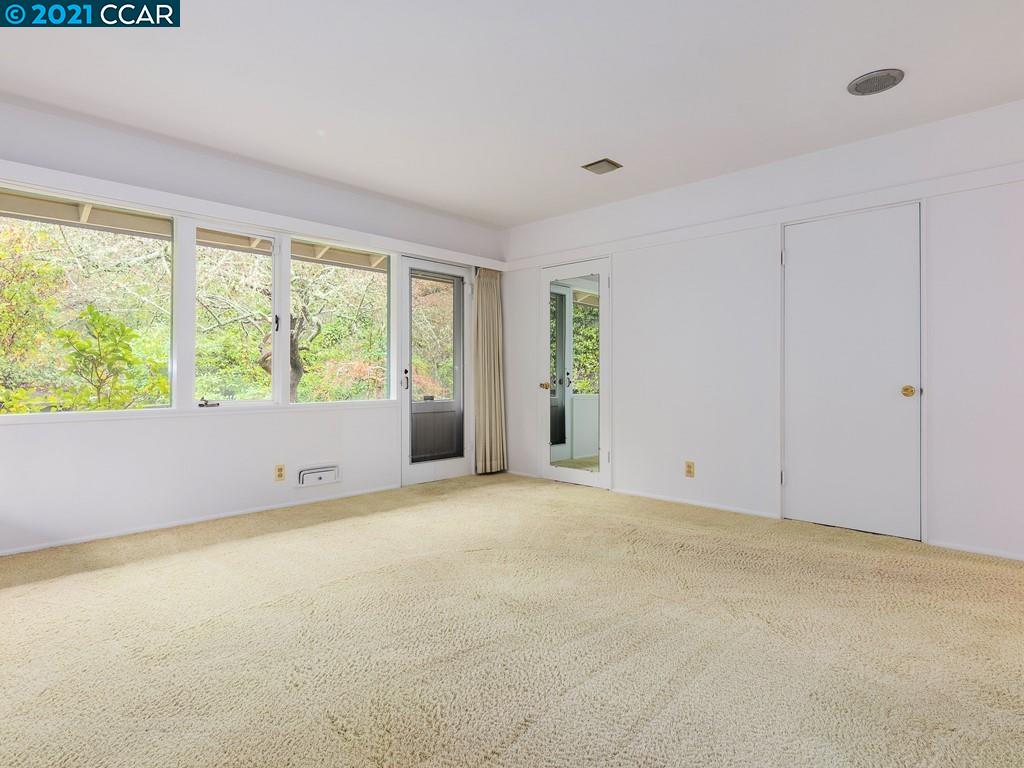 71 Orchard Road Orinda, CA 94563 - Photo 20 of 24 an empty room with a window