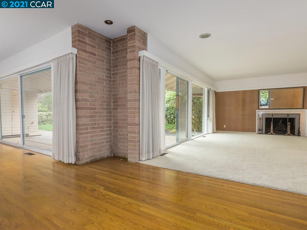 71 Orchard Road Orinda, CA 94563 - Photo 7 of 24 a view of an empty room with wooden floor and a window