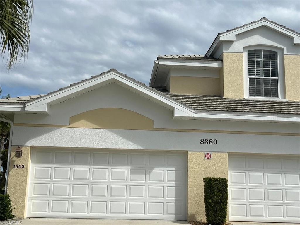 8380 Mystic Greens Way, Unit 1303 Naples, FL 34113 - Photo 21 of 25 a view of front door