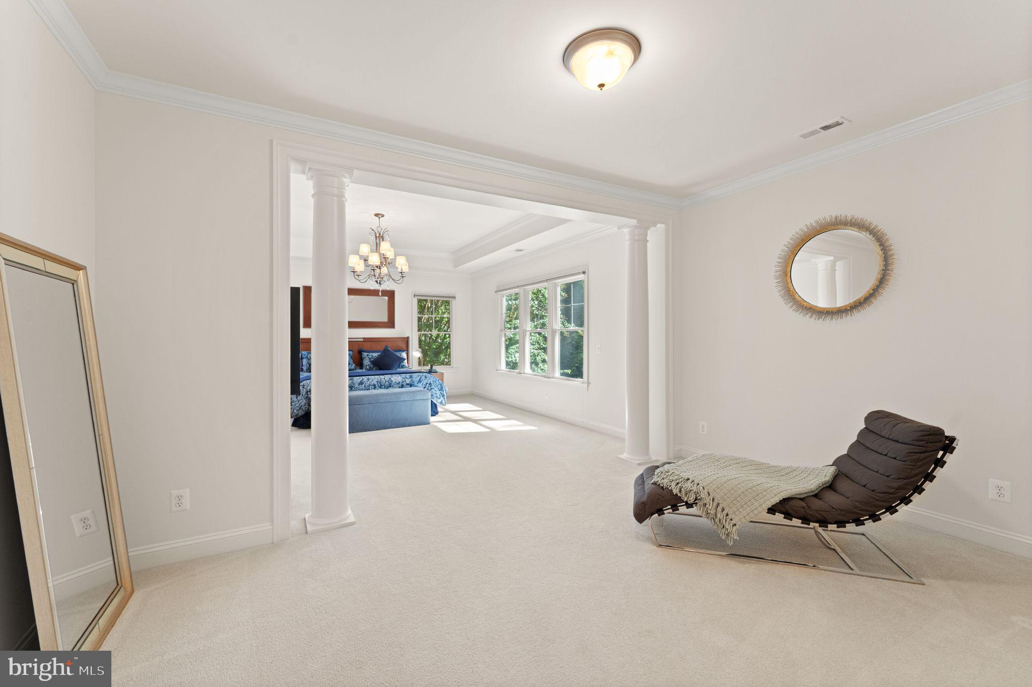 9603 Thistle Ridge Lane Vienna, VA 22182 - Photo 34 of 73 a living room with furniture and a mirror