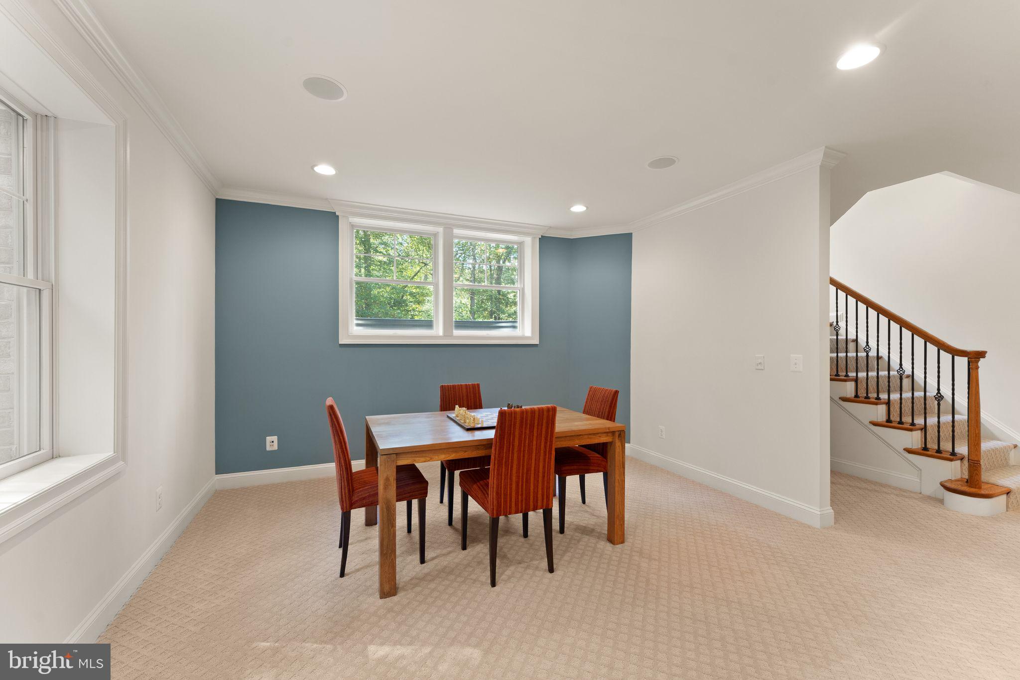 9603 Thistle Ridge Lane Vienna, VA 22182 - Photo 54 of 73 a view of a dining room with furniture and a window