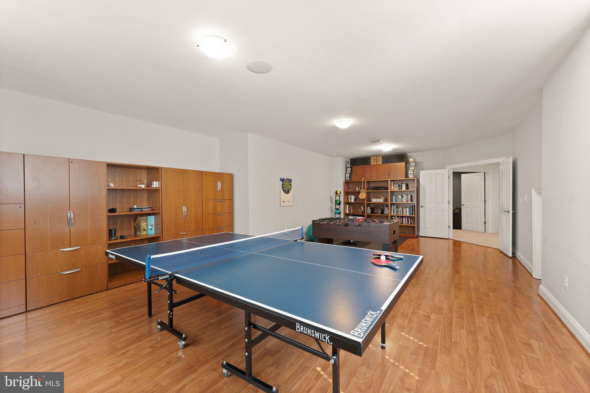 9603 Thistle Ridge Lane Vienna, VA 22182 - Photo 58 of 73 a view of a room with furniture and wooden floor
