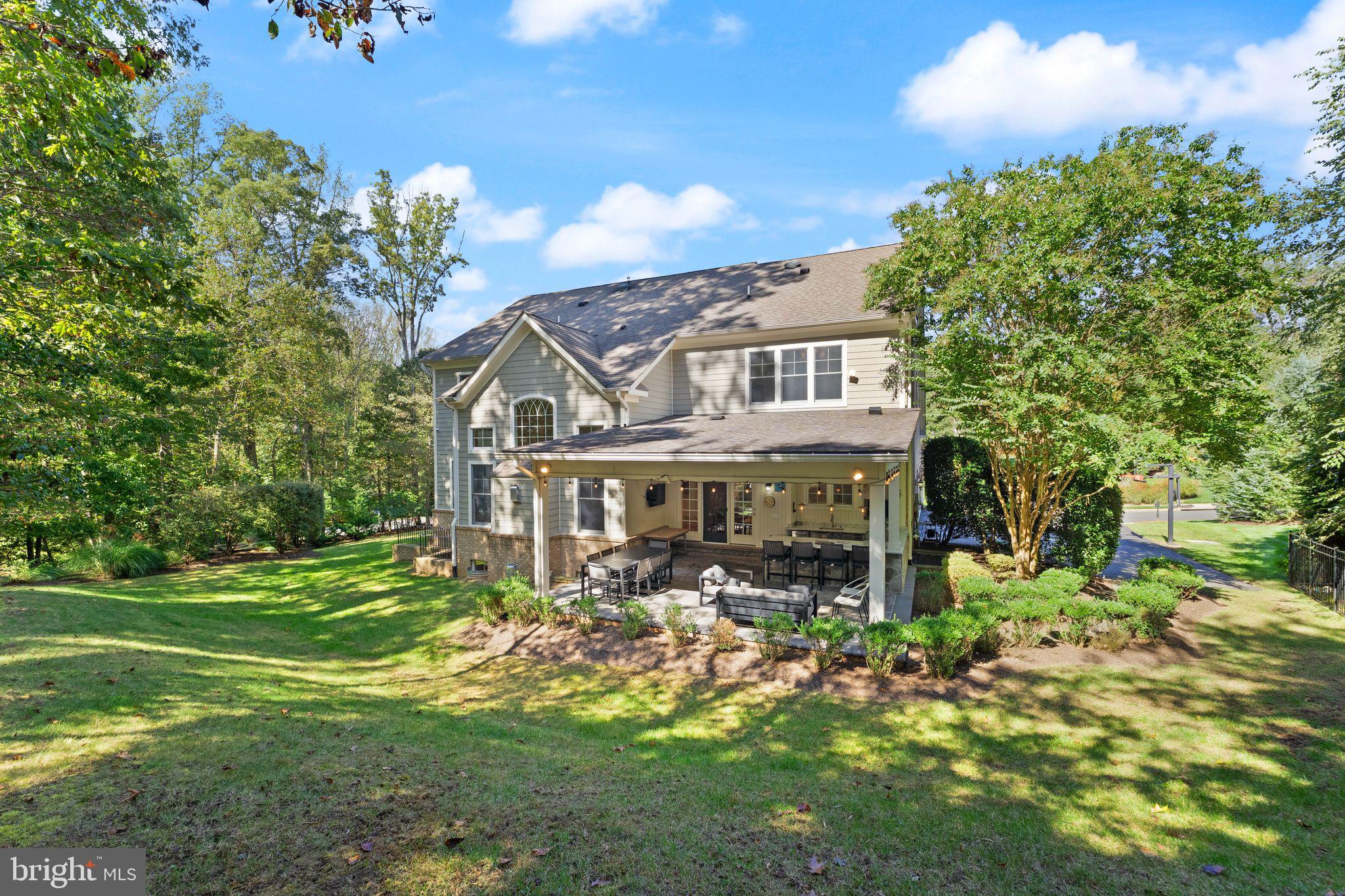 9603 Thistle Ridge Lane Vienna, VA 22182 - Photo 66 of 73 a front view of a house with a garden