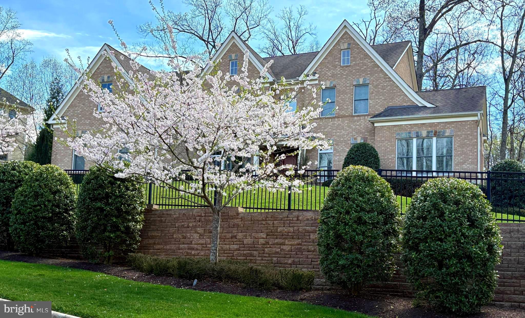 9603 Thistle Ridge Lane Vienna, VA 22182 - Photo 69 of 73 a view of a house with a yard and plants