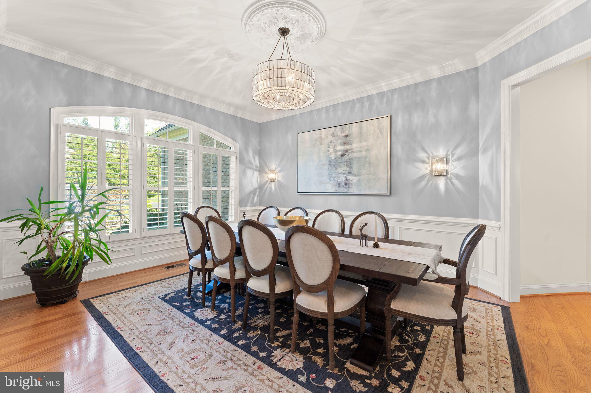 9603 Thistle Ridge Lane Vienna, VA 22182 - Photo 9 of 73 a view of a dining room with furniture window and wooden floor