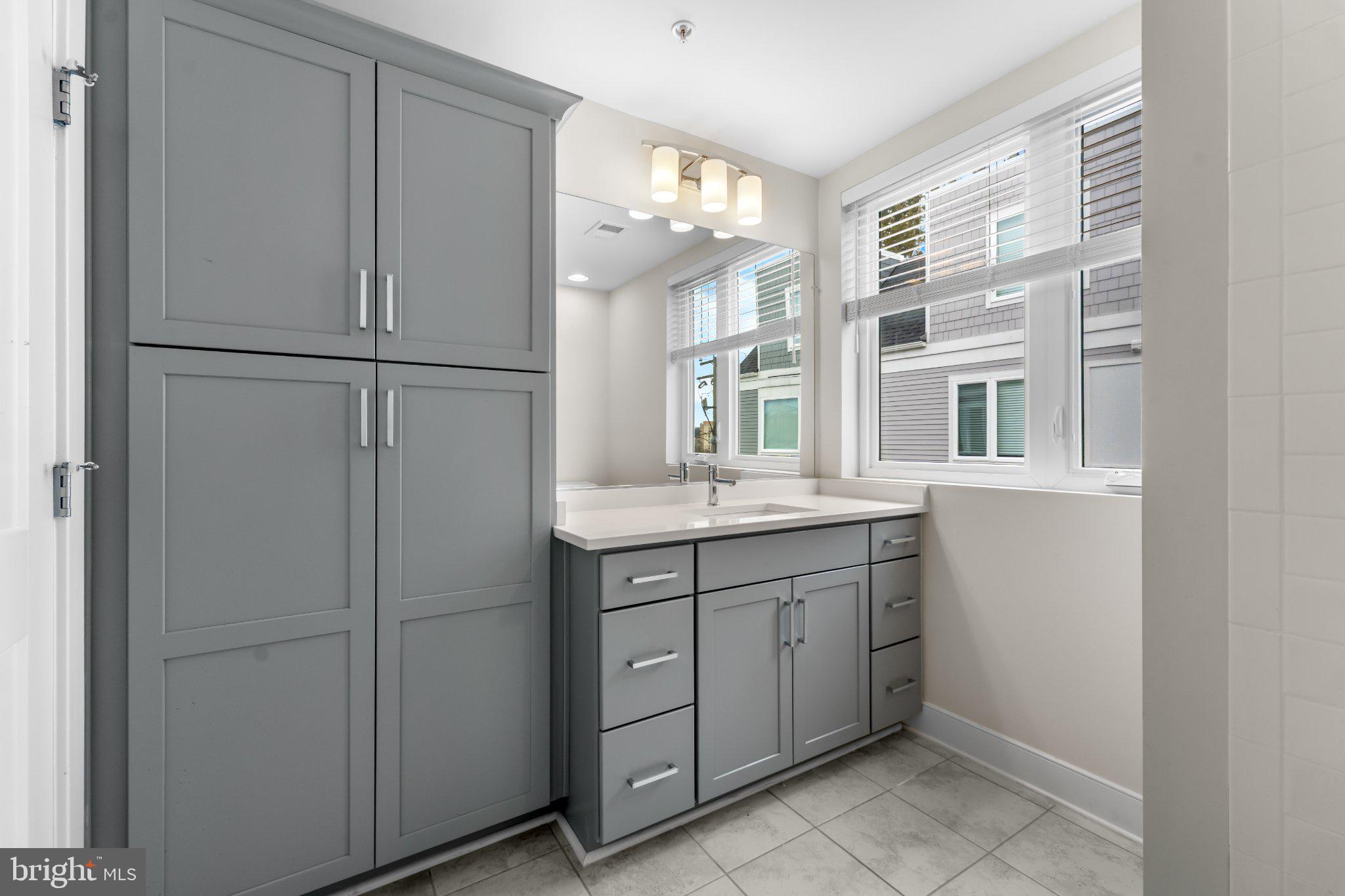 2827 24th Road South Arlington, VA 22206 - Photo 26 of 48 Sleek modern bathroom with natural light.
