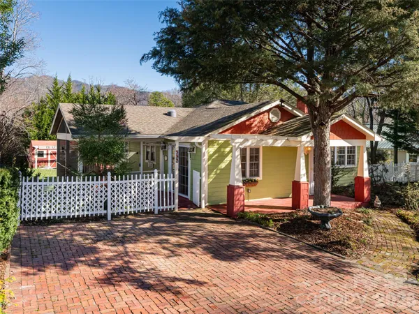 a front view of a house having yard