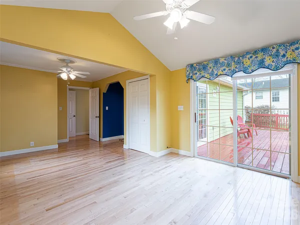 a view of an entryway with wooden floor