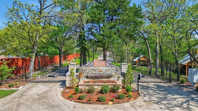 a view of a chair and table in backyard