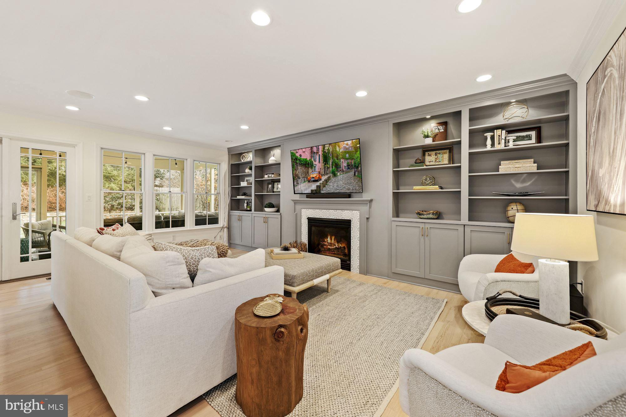 5821 Plainview Road Bethesda, MD 20817 - Photo 15 of 46 Family room has built-ins and fireplace