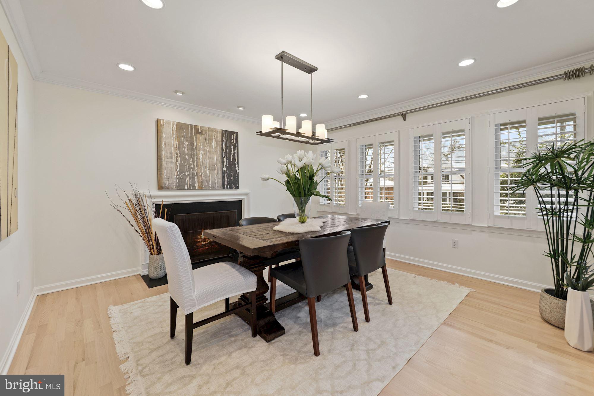 5821 Plainview Road Bethesda, MD 20817 - Photo 16 of 46 Formal dining has plantation shutters and 2nd FP