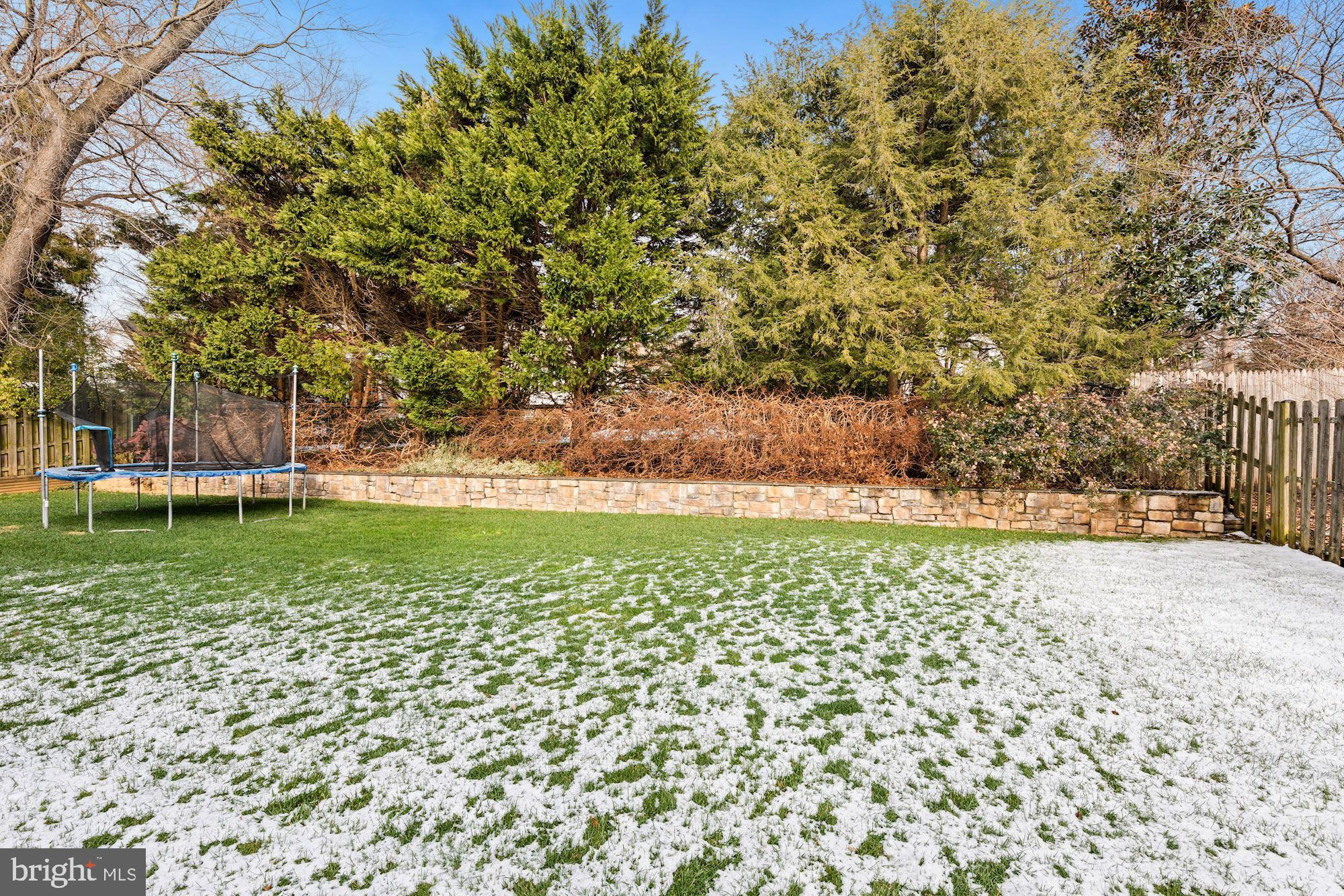 5821 Plainview Road Bethesda, MD 20817 - Photo 39 of 46 Private stone retaining wall and fence