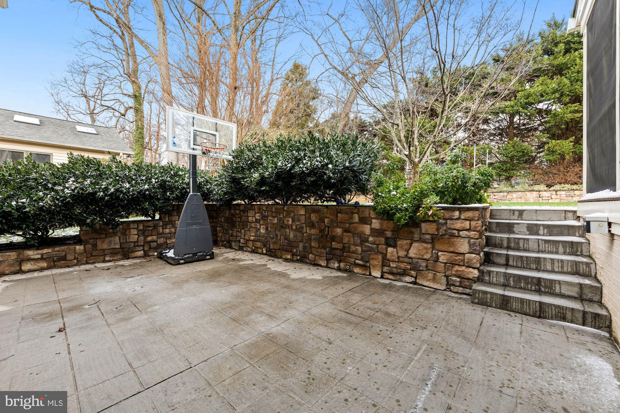 5821 Plainview Road Bethesda, MD 20817 - Photo 40 of 46 Large stone patio great for sport court or firepit