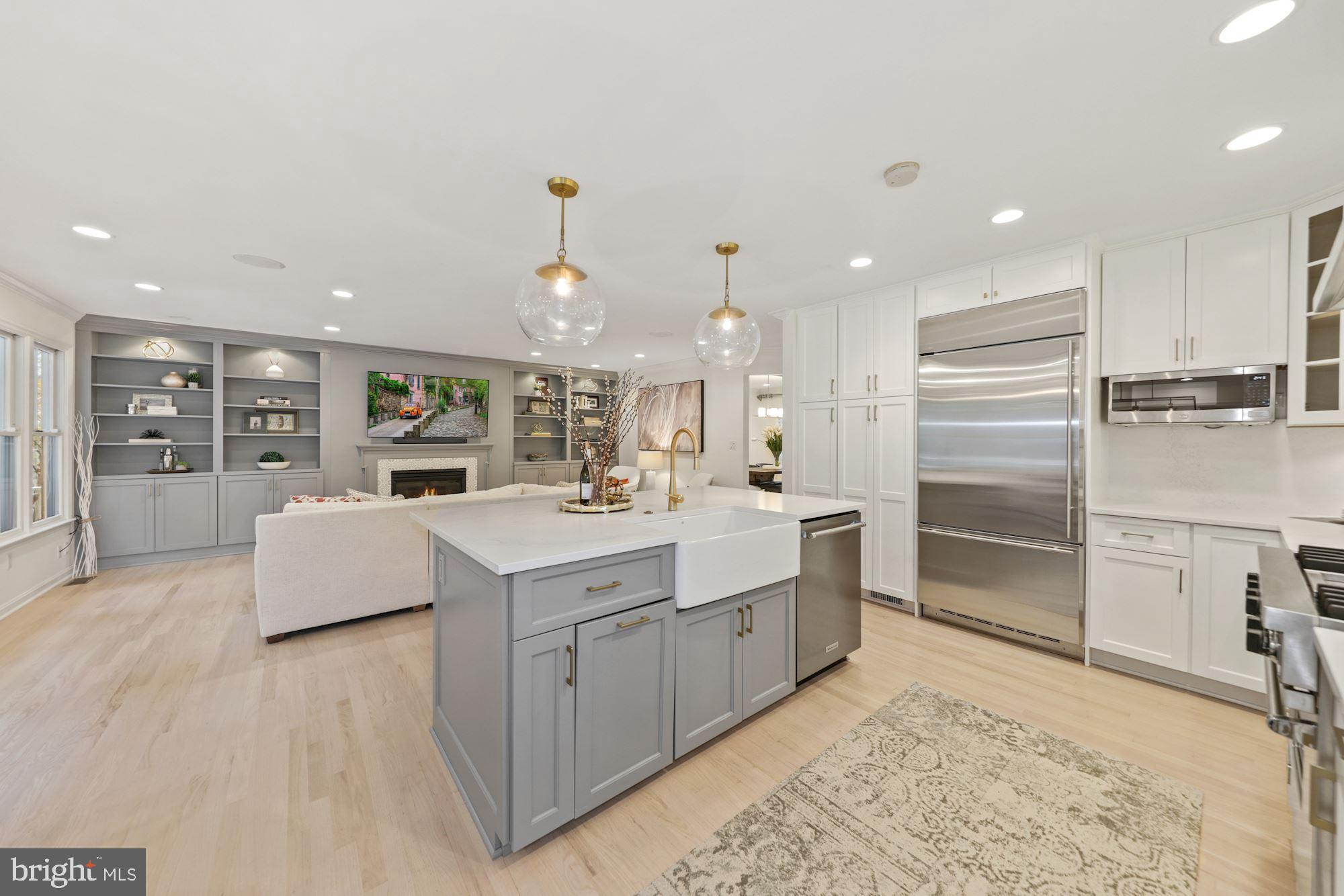 5821 Plainview Road Bethesda, MD 20817 - Photo 7 of 46 Kitchen center island opens to family room