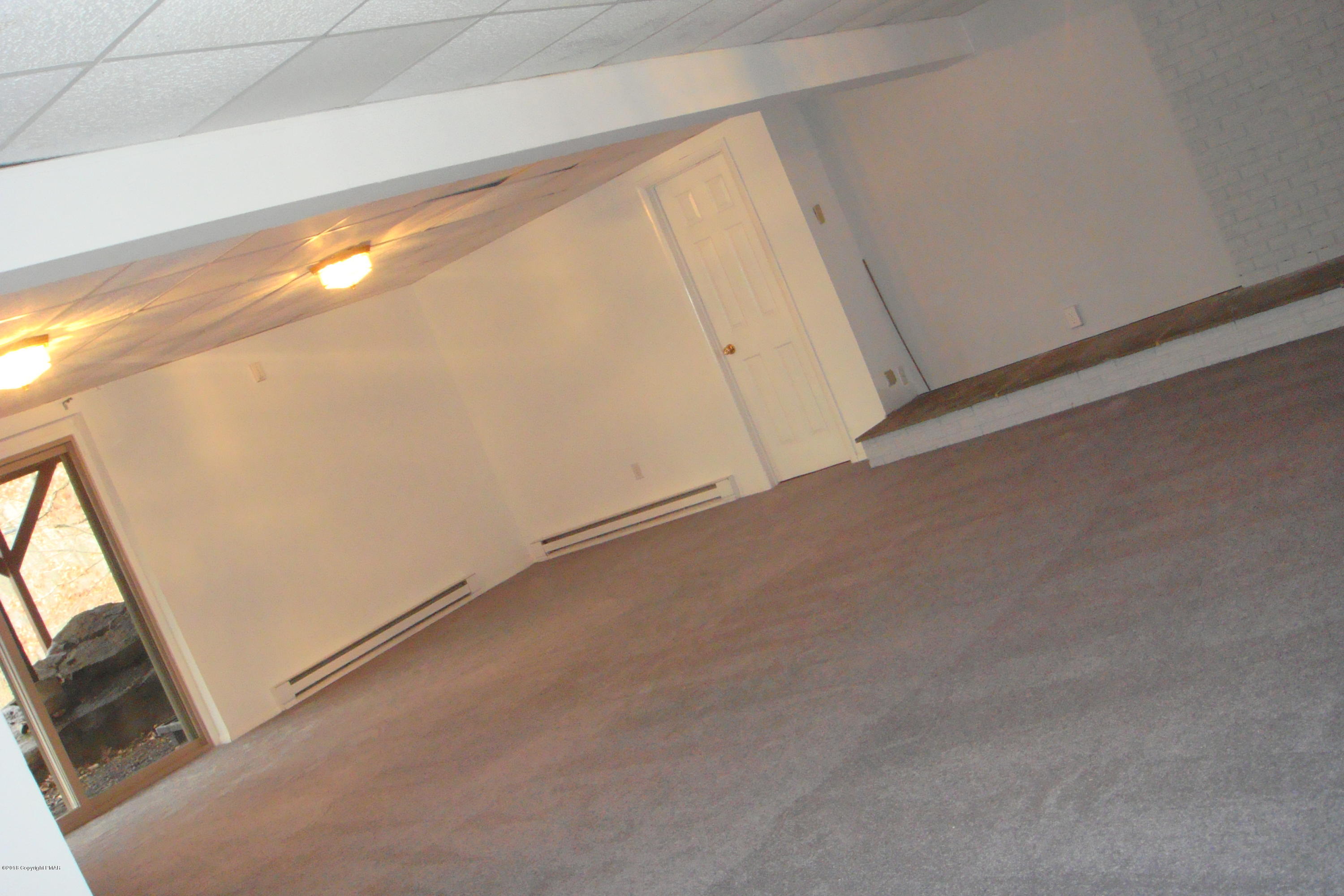 6375 Decker Road Bushkill, PA 18324 - Photo 46 of 60 a view of a room with wooden floor