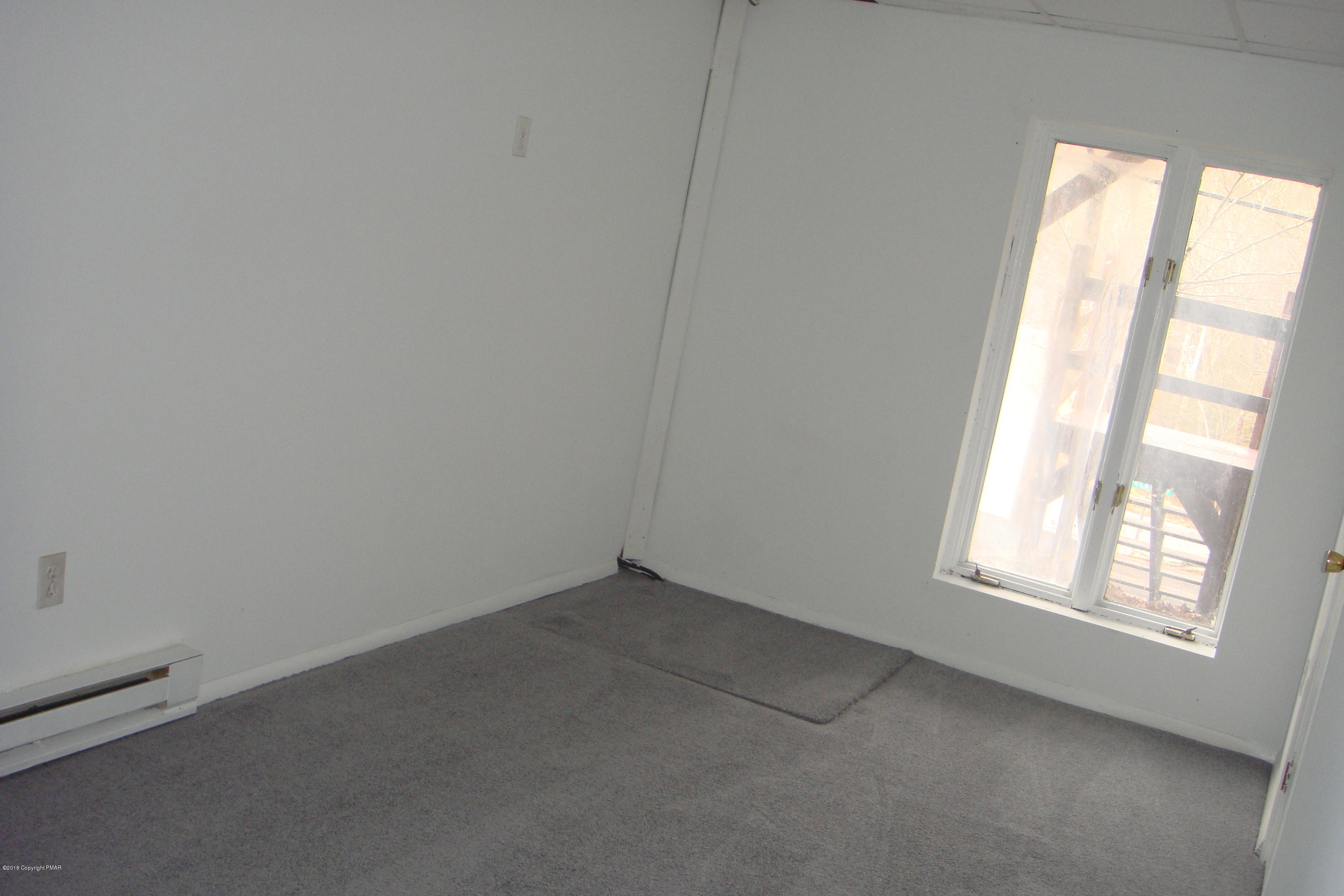 6375 Decker Road Bushkill, PA 18324 - Photo 53 of 60 an empty room with a window