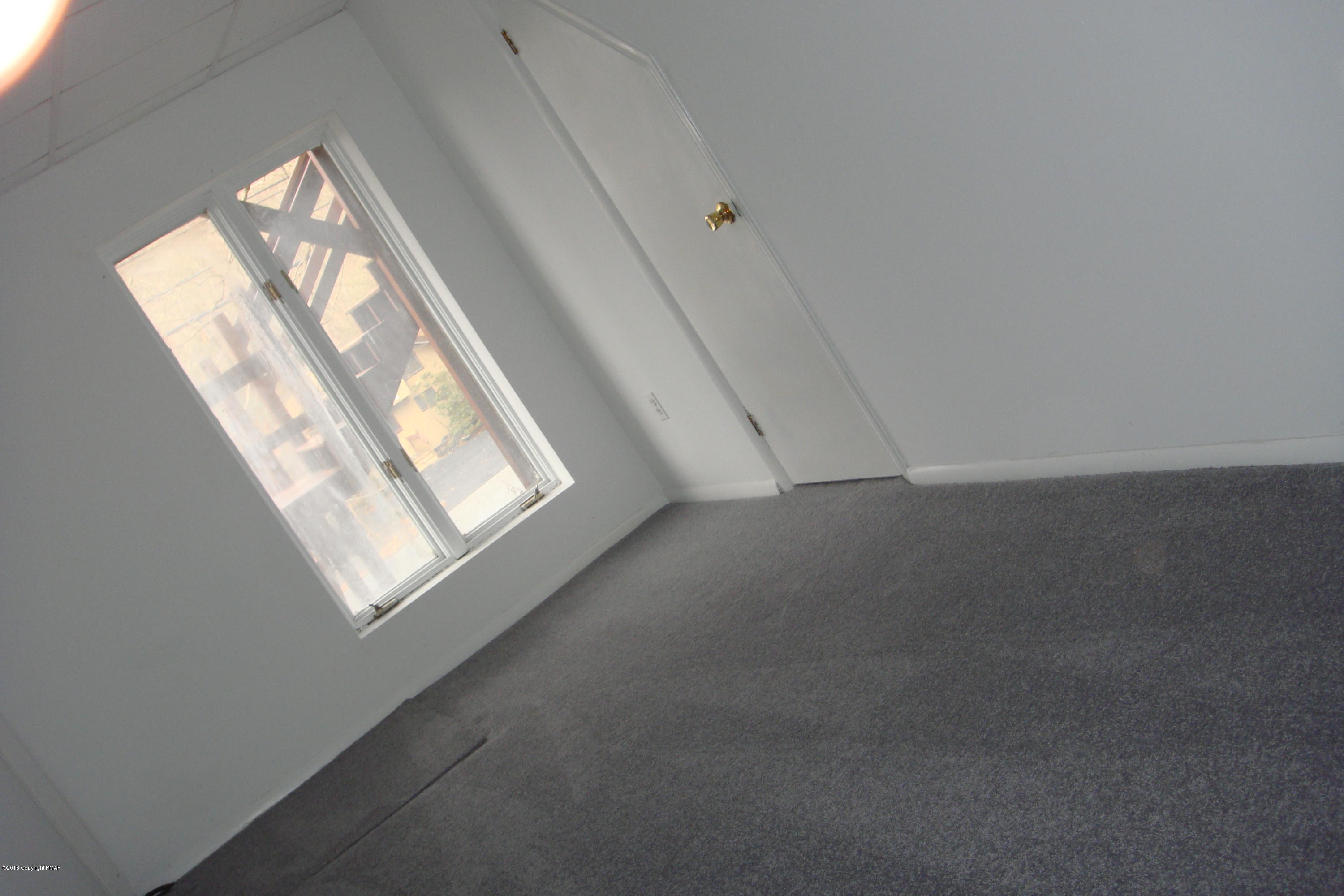 6375 Decker Road Bushkill, PA 18324 - Photo 54 of 60 an empty room with windows and view