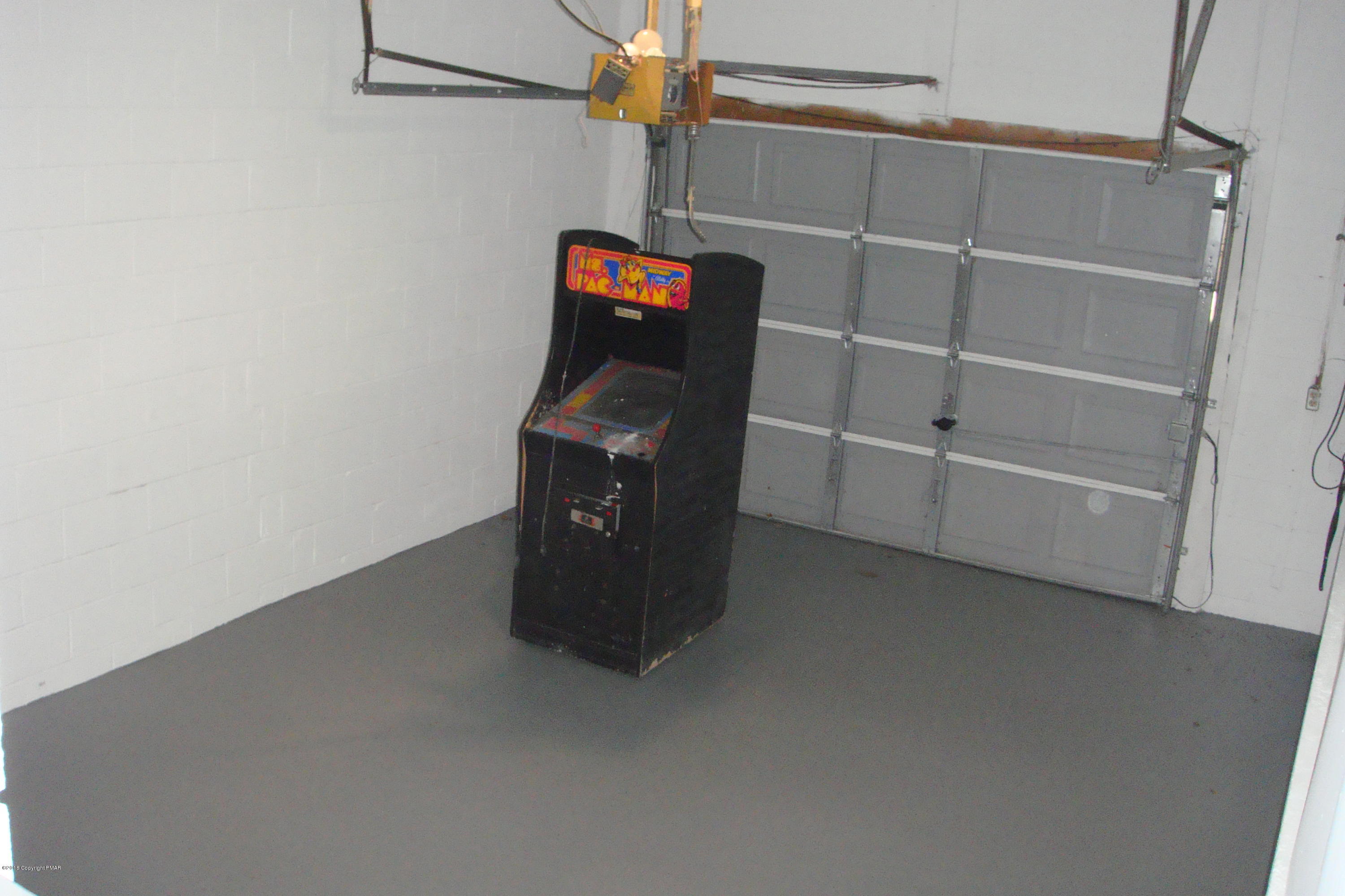6375 Decker Road Bushkill, PA 18324 - Photo 57 of 60 a view of storage and utility room with empty racks