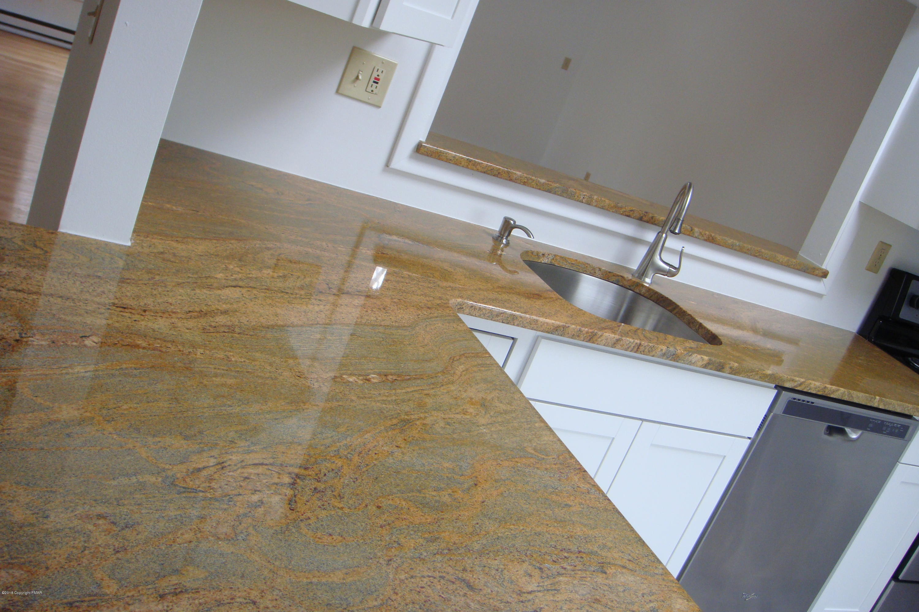 6375 Decker Road Bushkill, PA 18324 - Photo 10 of 60 a bathroom with a sink and mirror