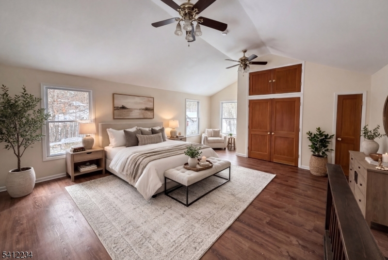 903 Green Pond Road Rockaway, NJ 07866 - Photo 3 of 13 a bedroom with a bed couch and window