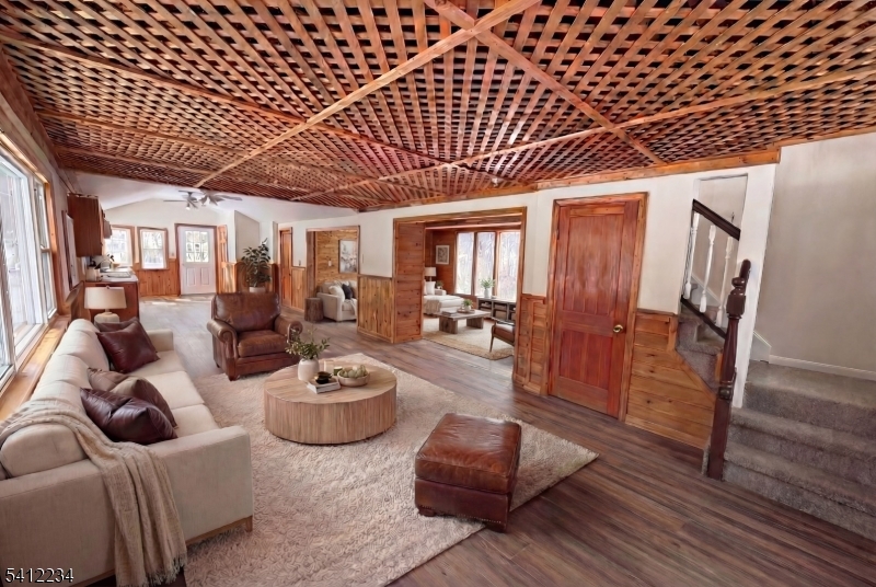 903 Green Pond Road Rockaway, NJ 07866 - Photo 6 of 13 a living room with furniture and a wooden floor