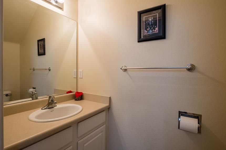 667 Shadow Way Central Point, OR 97502 - Photo 13 of 26 a bathroom with a sink and a mirror