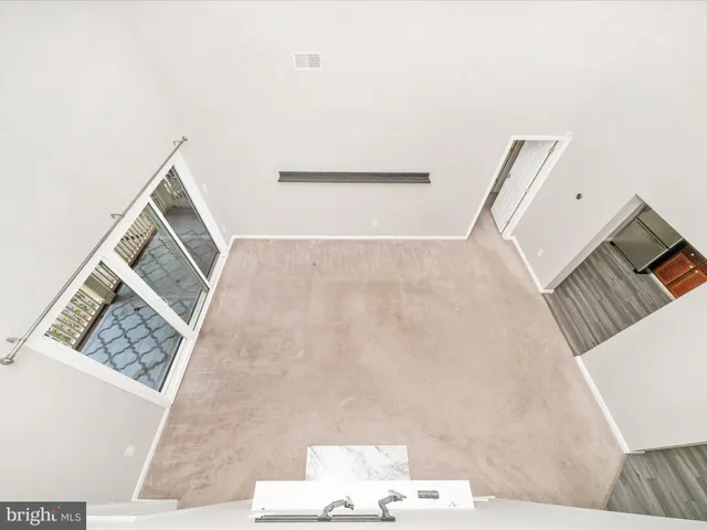 a kitchen with stainless steel appliances granite countertop a stove a sink dishwasher and a refrigerator