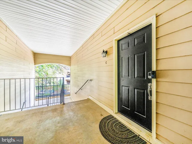 front view of a house with a garden