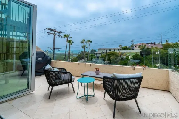a kitchen with center island and stainless steel appliances