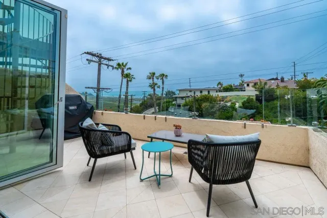 a kitchen with center island and stainless steel appliances