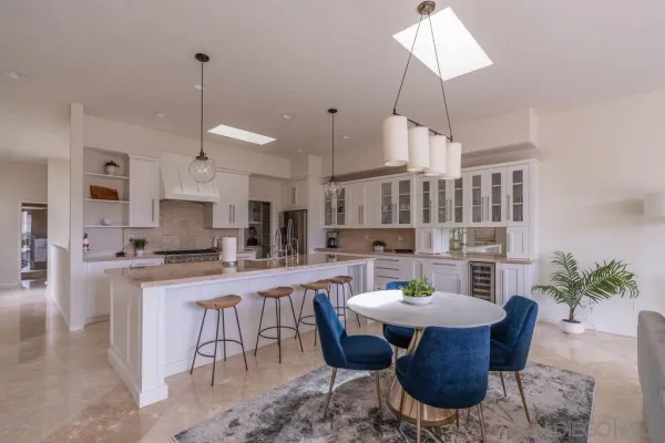 a kitchen with a cabinets and a window