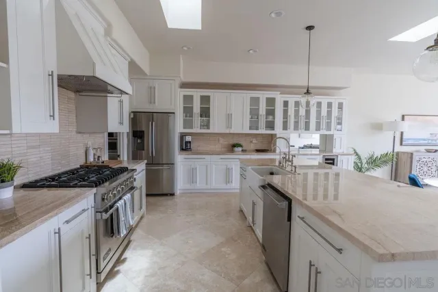 a view of a livingroom with furniture and a window