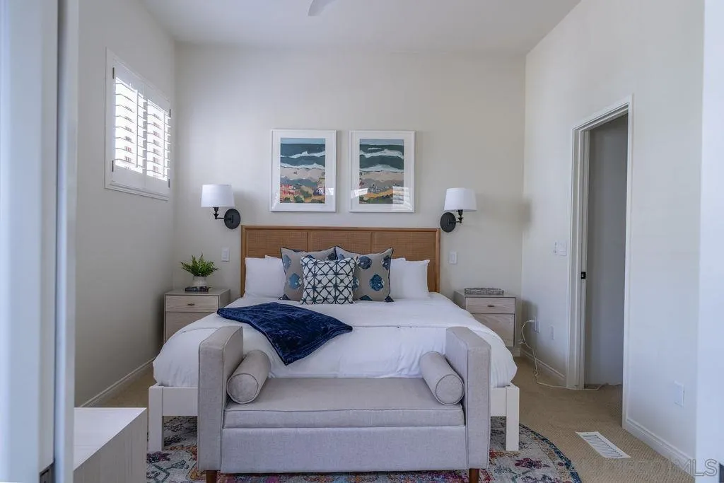 2508 Manchester Avenue Cardiff, CA 92007 - Photo 34 of 75 a bedroom with a bed and a window