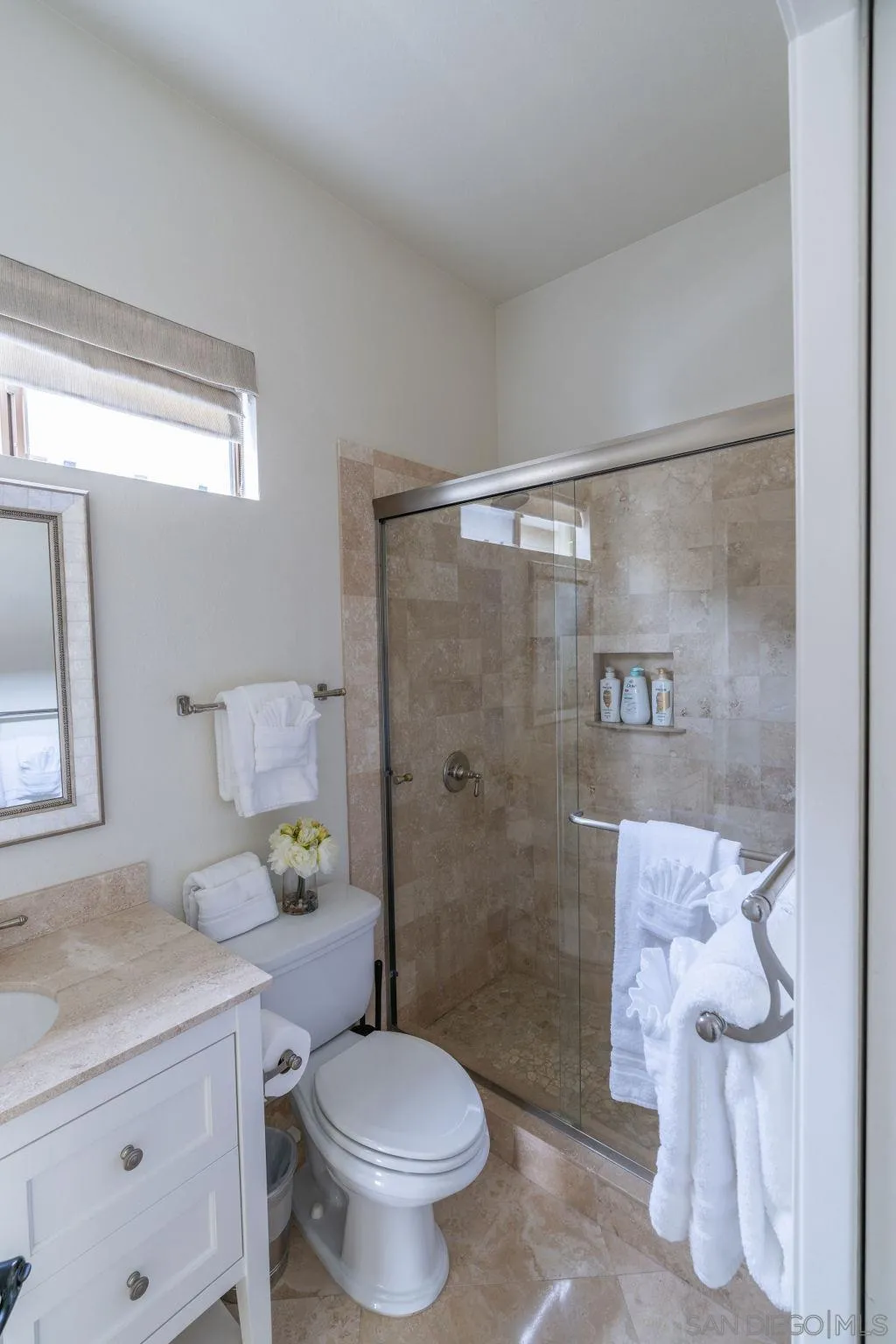 2508 Manchester Avenue Cardiff, CA 92007 - Photo 36 of 75 a bathroom with a granite countertop sink toilet and shower