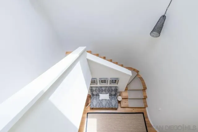 a bathroom with a shower and a toilet