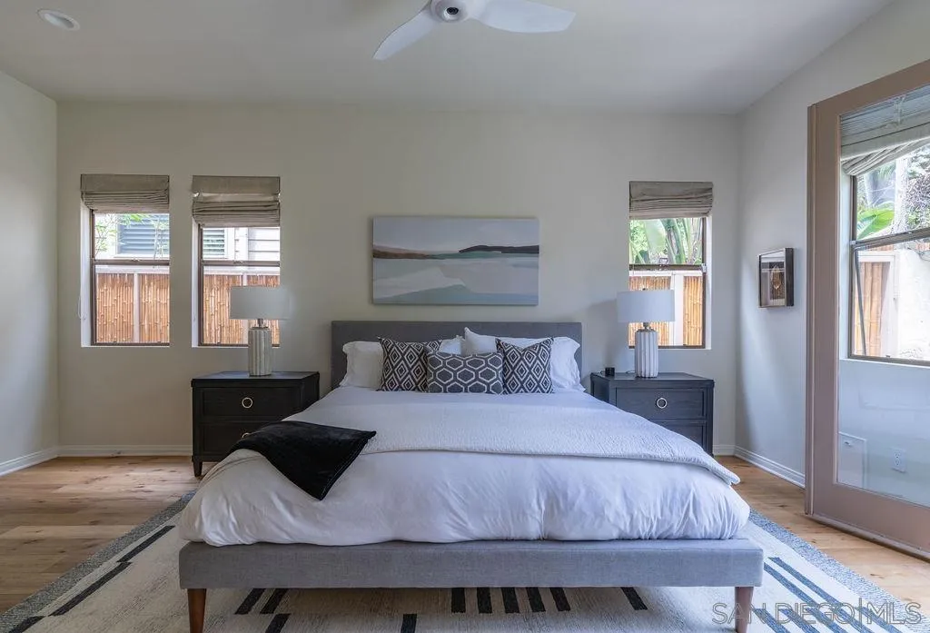 2508 Manchester Avenue Cardiff, CA 92007 - Photo 45 of 75 a bedroom with a bed and wooden floor