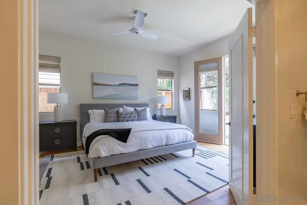 2508 Manchester Avenue Cardiff, CA 92007 - Photo 46 of 75 a bedroom with a bed and a painting on the wall