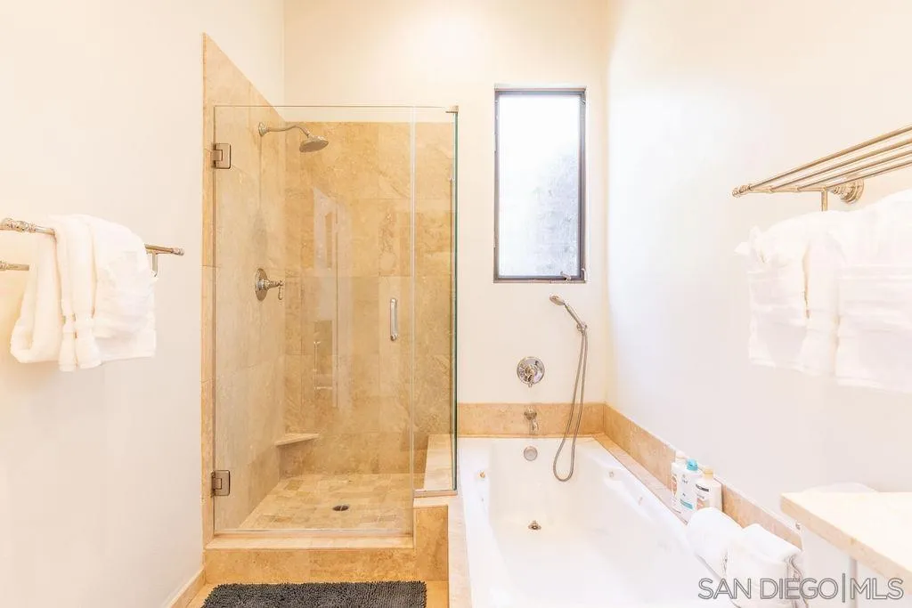 2508 Manchester Avenue Cardiff, CA 92007 - Photo 52 of 75 a bathroom with a bathtub and a shower