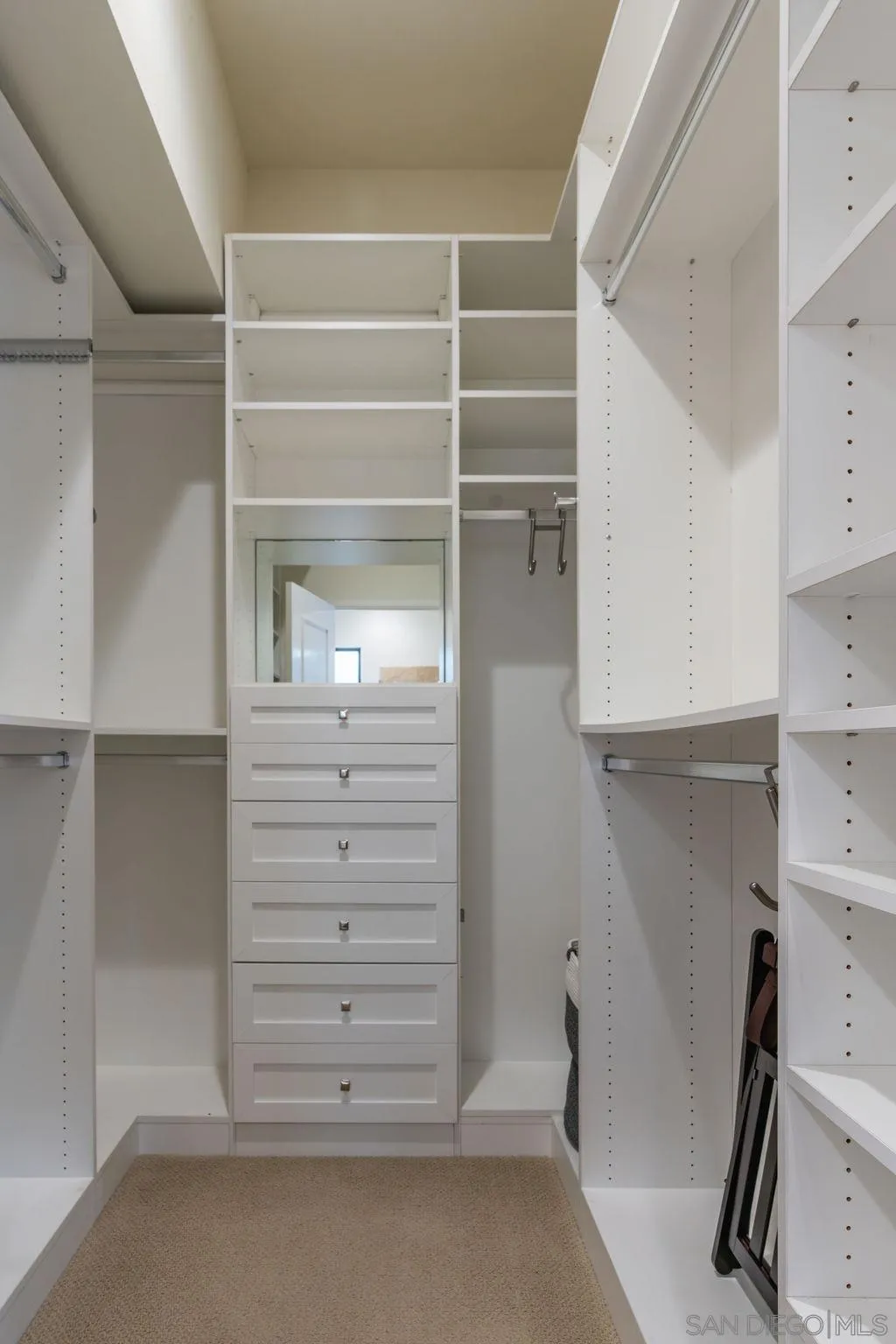 2508 Manchester Avenue Cardiff, CA 92007 - Photo 54 of 75 a view of walk in closet with clothes and shoes